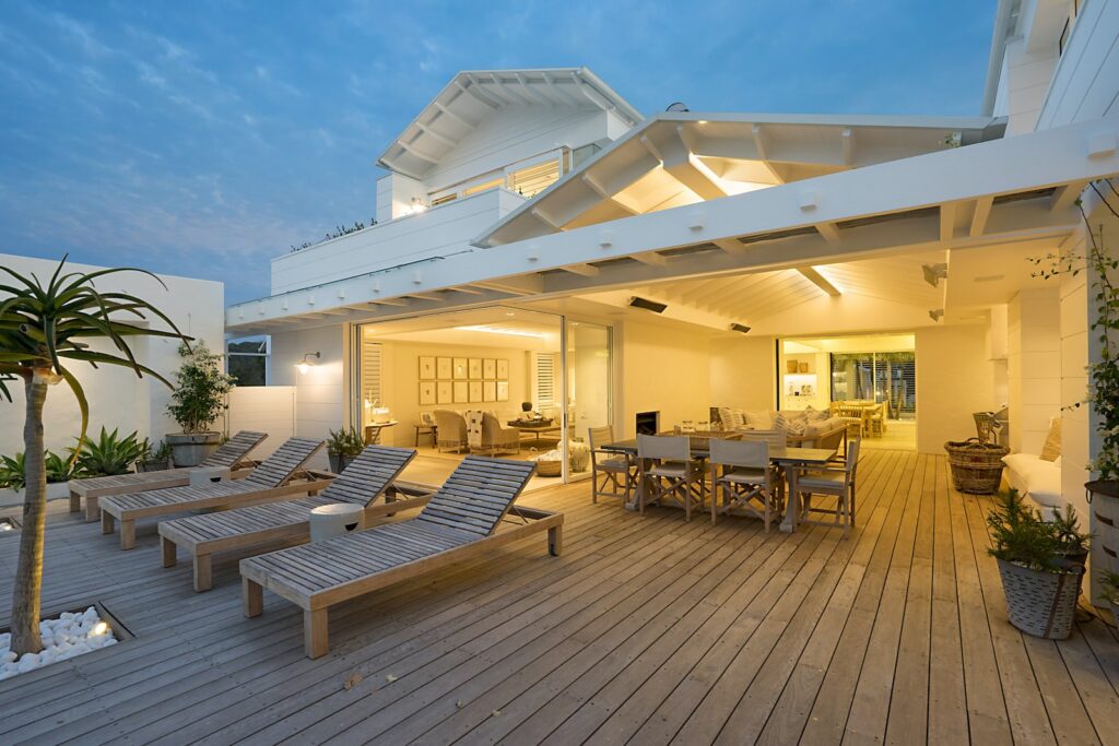 white wooden pool bench near house